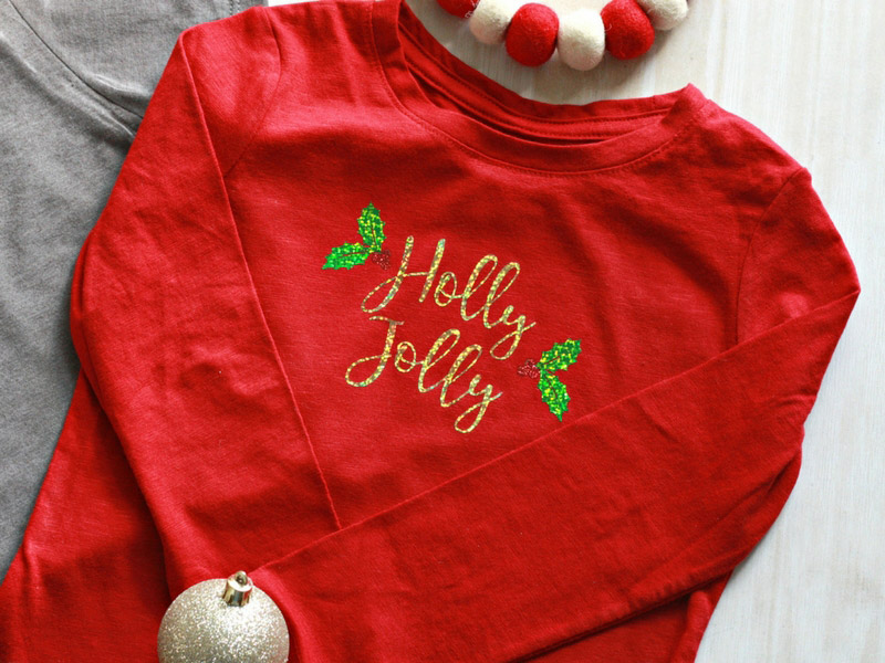 Holly Jolly T-shirt made with Cricut machines and materials