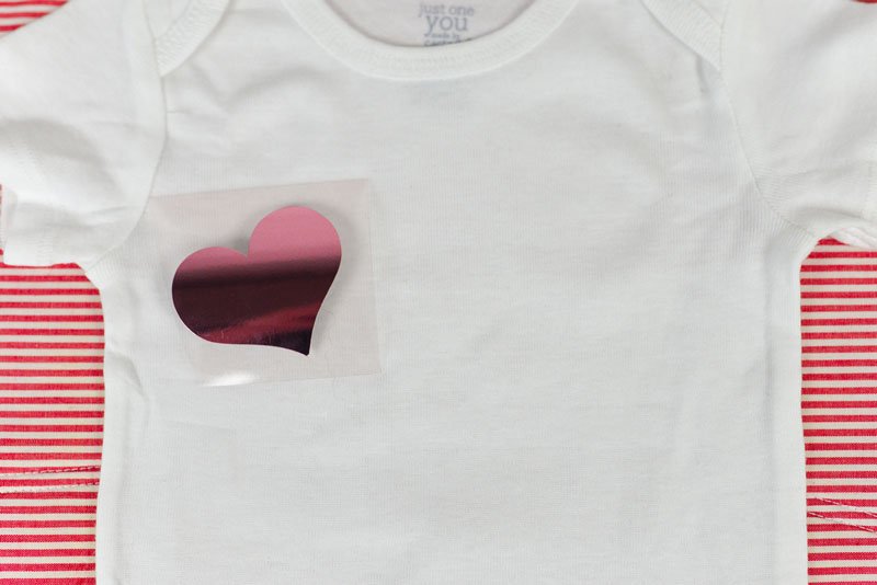 Mommy & Daddy’s Little Valentine Onesies Apply the iron-on and iron-on foil to the onesie