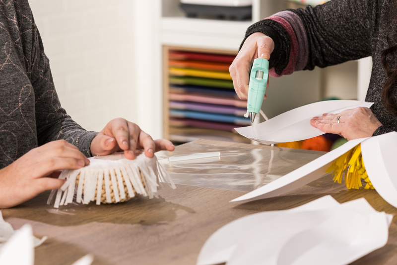 8: Glue Petals to Center DIY Giant Paper Daisies, DIY paper flowers, DIY flowers