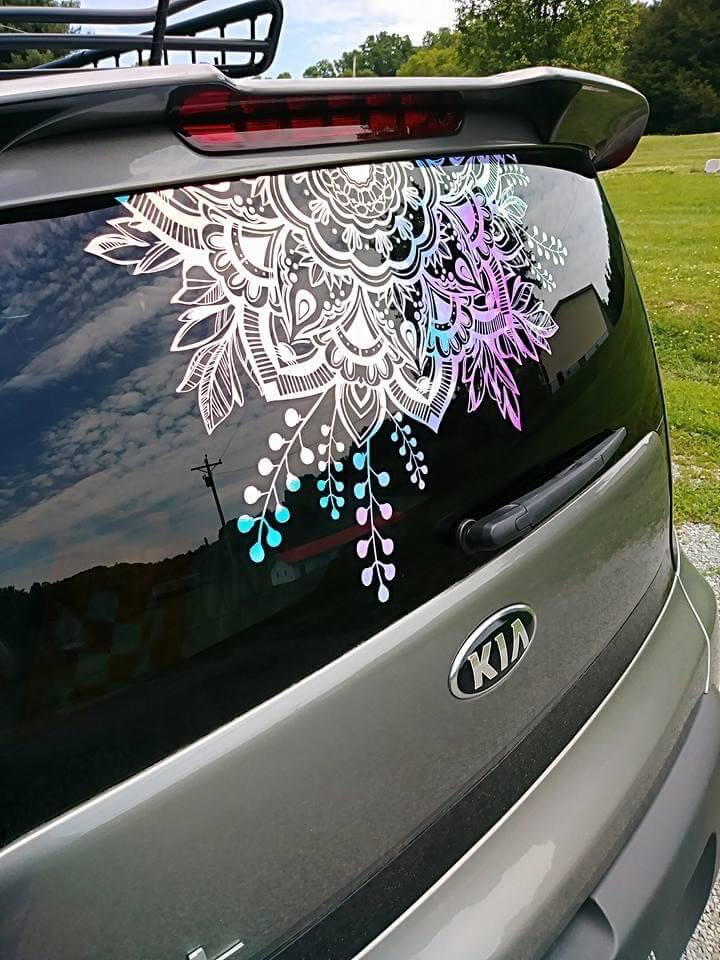 The Davis' car with custom mandala decal cut by Cricut