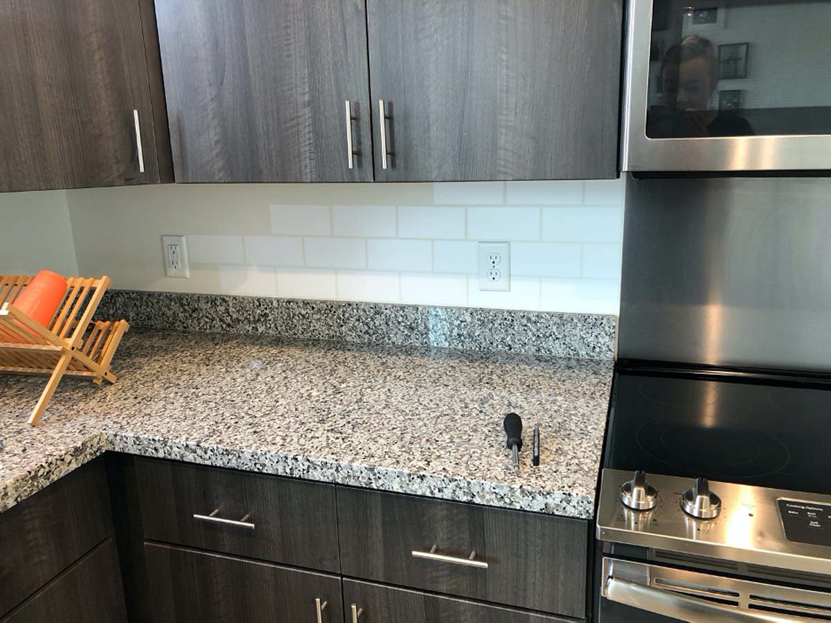 Faux subway tile in kitchen using a Cricut machine