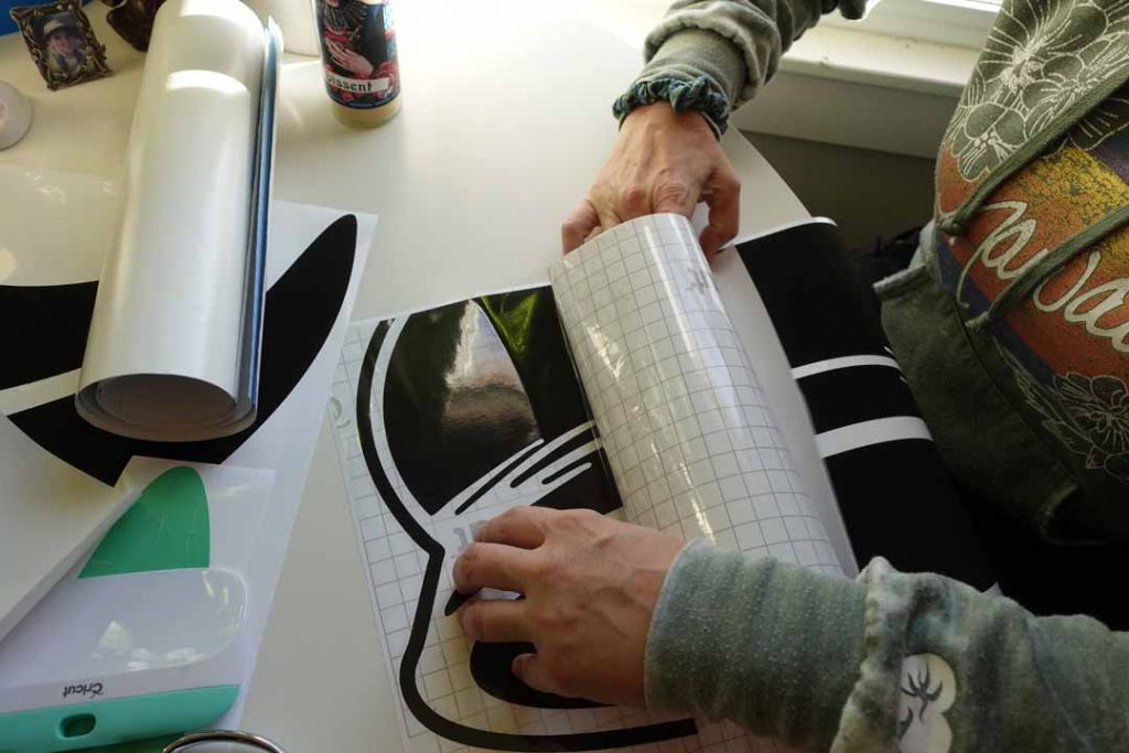 adding transfer tape to a vinyl decal