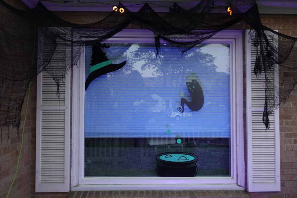 Finished Halloween vinyl silhouettes in window