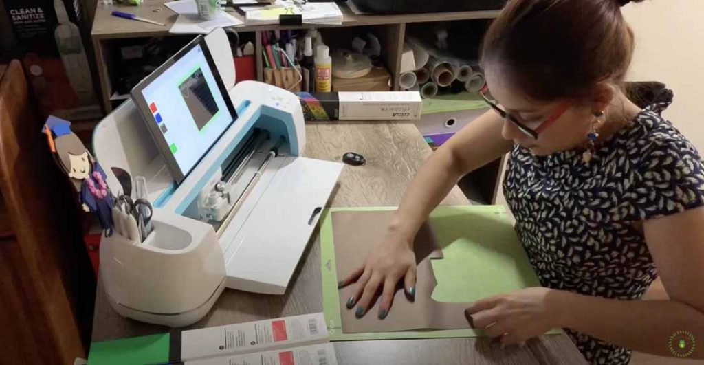 Abigail Carrillo crafting with her Cricut Explore cutting machine