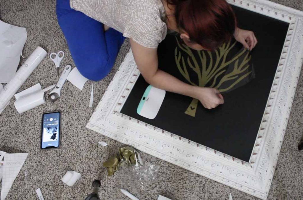 Abigail Carrillo crafting with her Cricut tools