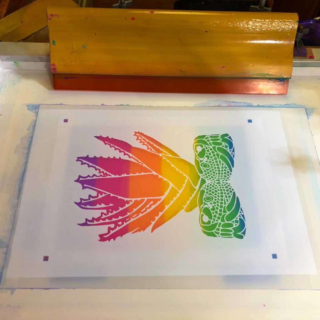 Screen with Cricut vinyl stencil applied before inking from Melanie Cervantes