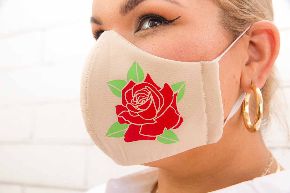 Ashley Nell Tipton - Selena Como la Flor face mask