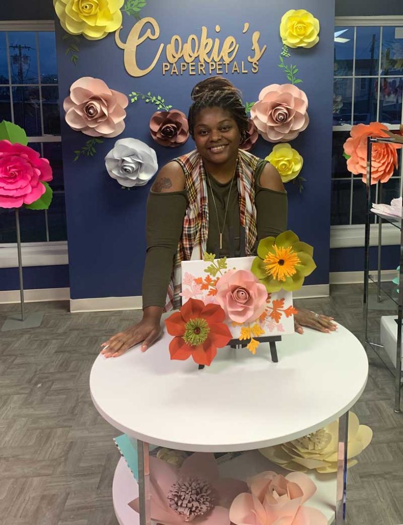 Anastasia Jackson with fall paper flowers