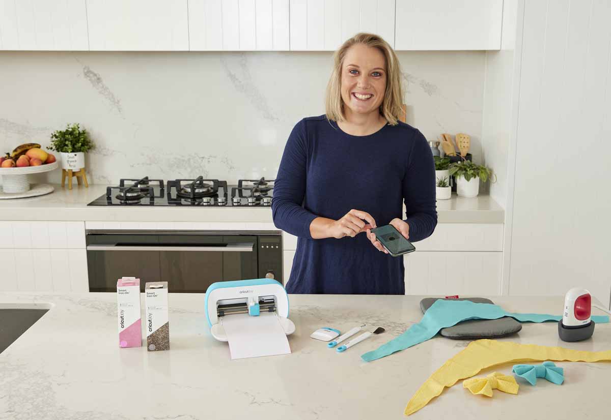 Cricketer Alyssa Healy making bandanas for her dogs with Cricut Joy