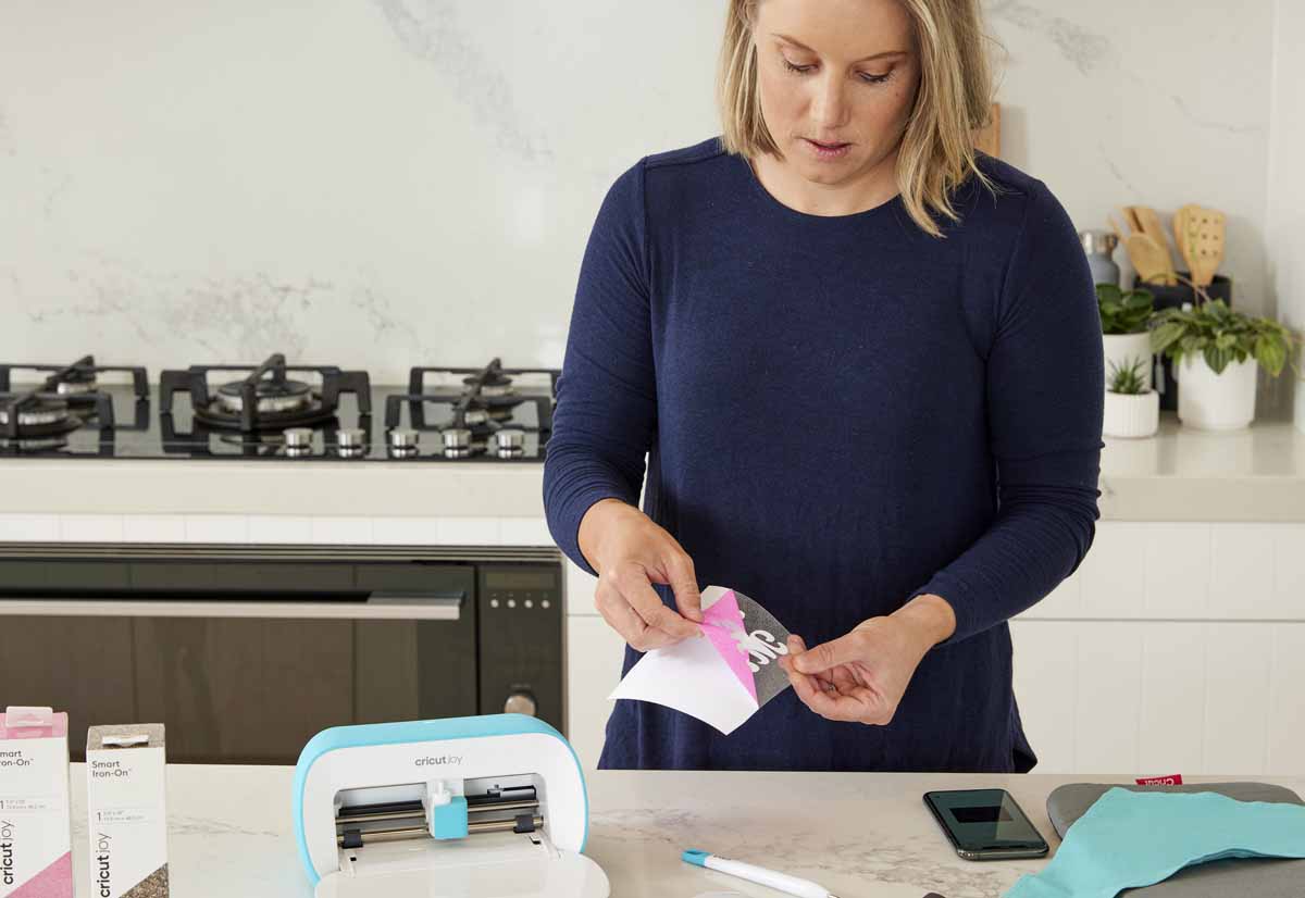 Cricketer Alyssa Healy making bandanas for her dogs with Cricut Joy