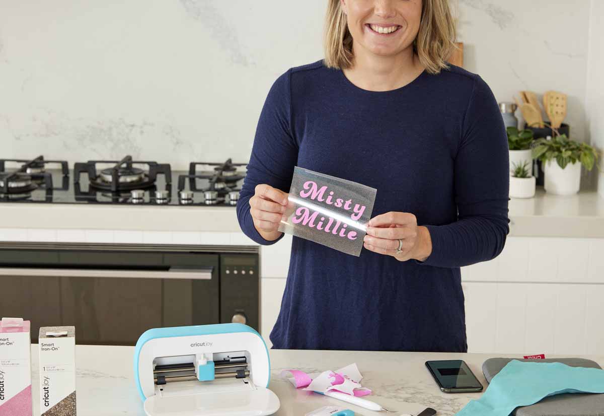 Cricketer Alyssa Healy making bandanas for her dogs with Cricut Joy