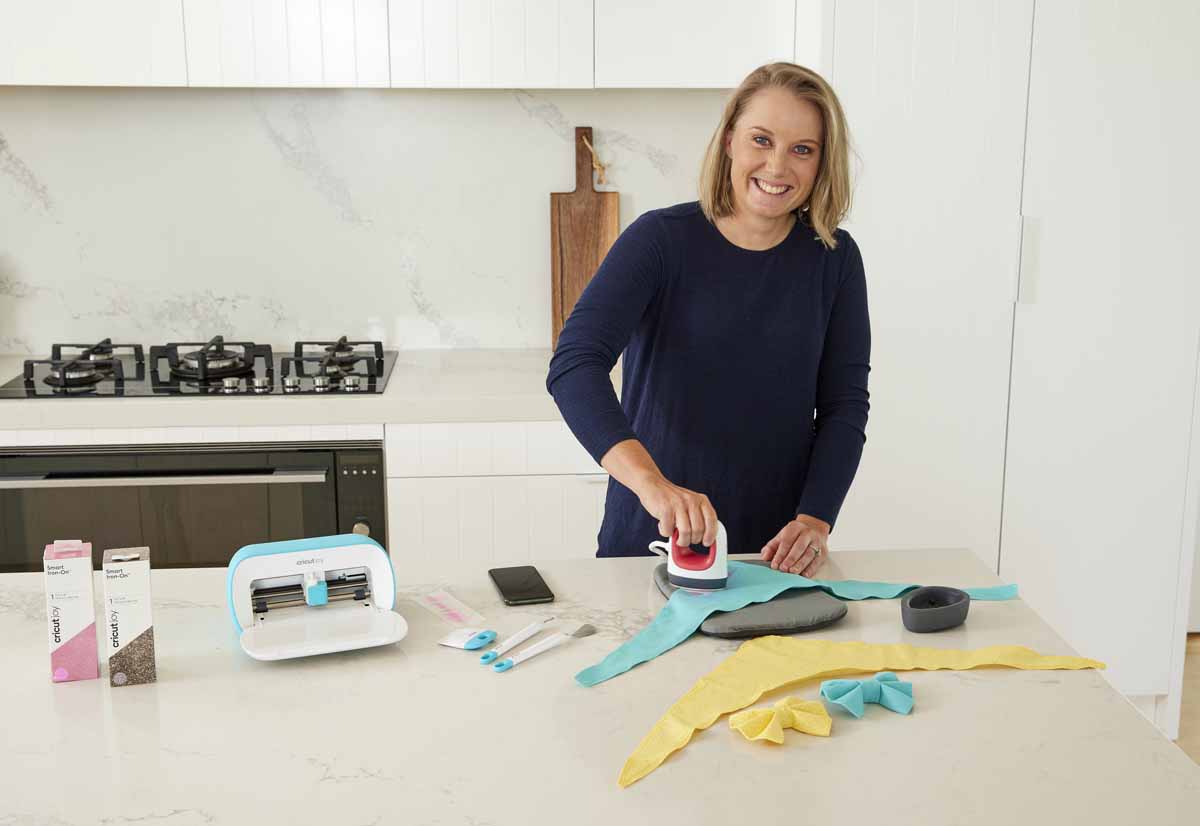 Cricketer Alyssa Healy making bandanas for her dogs with Cricut Joy