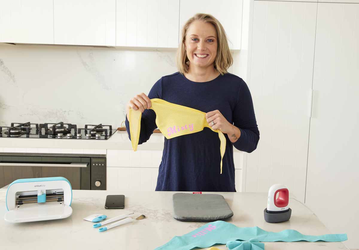 Cricketer Alyssa Healy making bandanas for her dogs with Cricut Joy