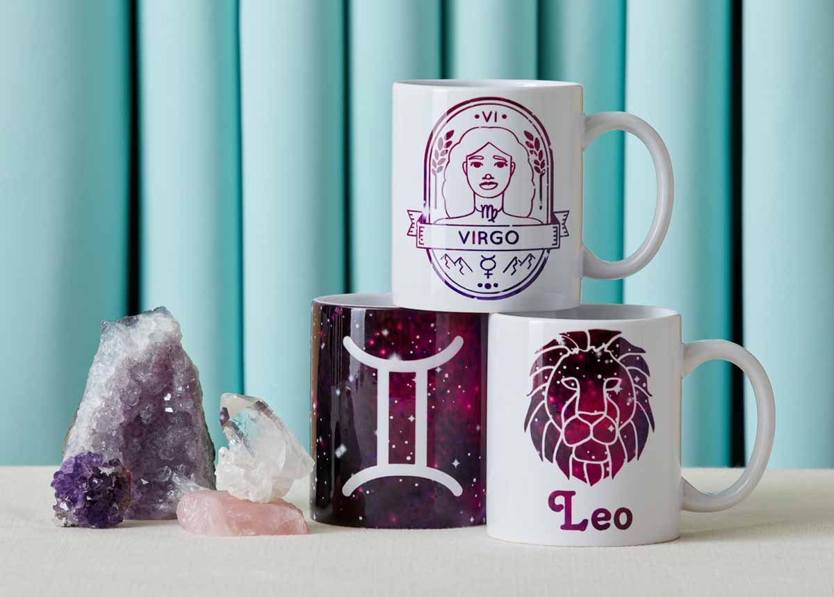 Set of personalized astrological sign mugs with Cricut