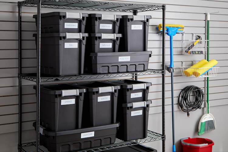 Organized garage with bins on shelves