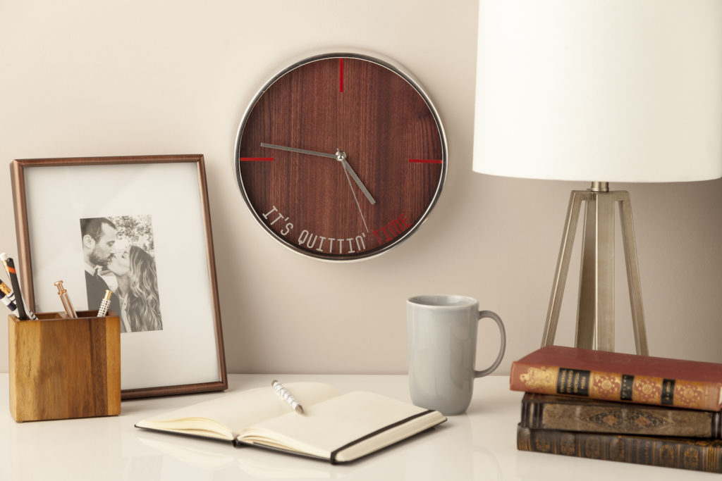 Desk space with clock