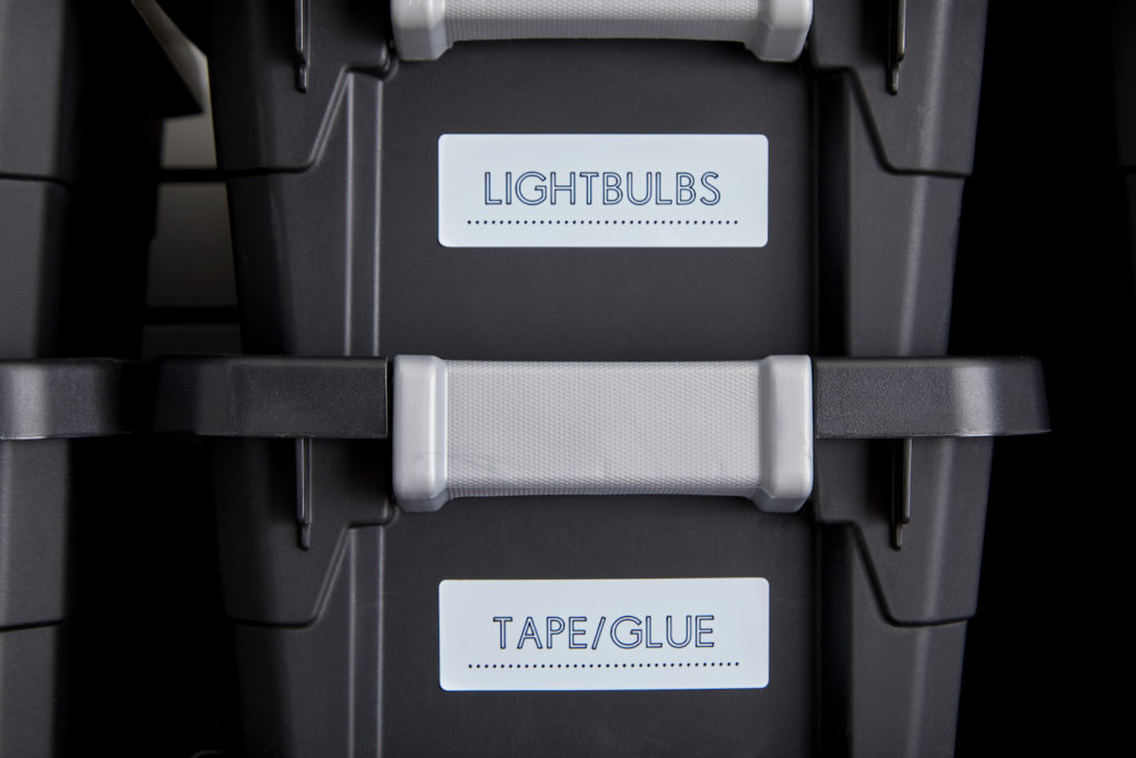 Labels on black storage bins