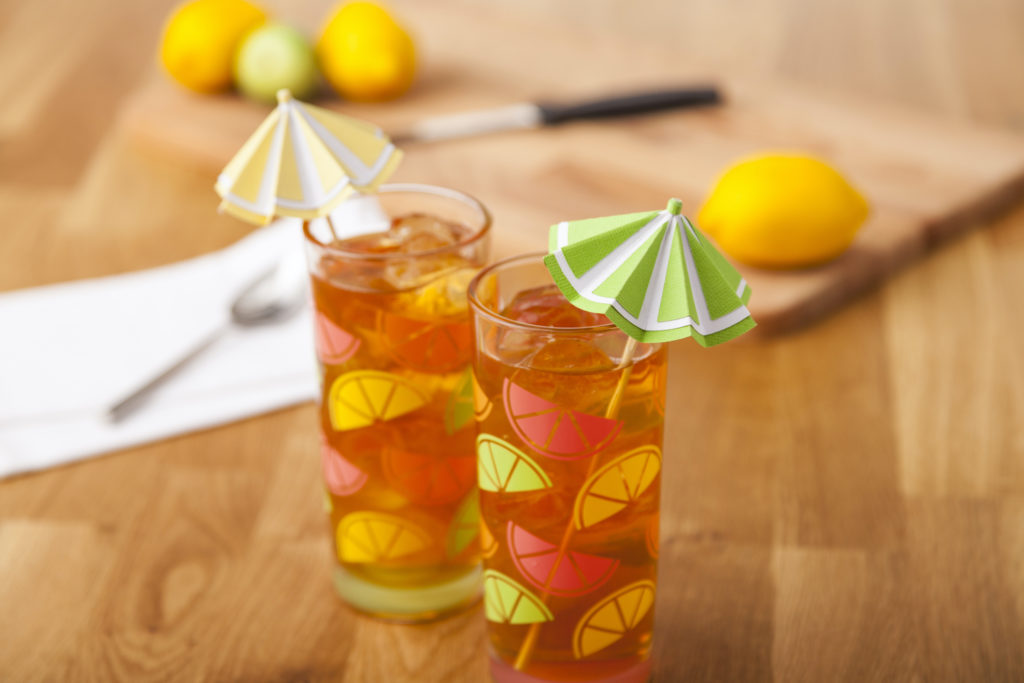 Two glasses with umbrellas