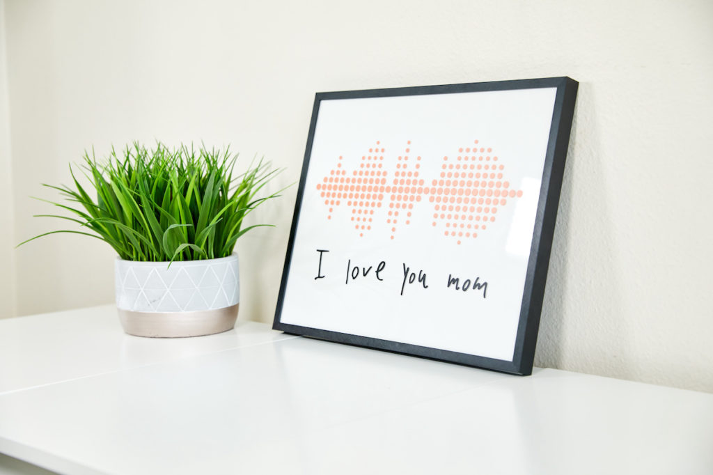 A thoughtful Mother's Day gift idea, "I love you Mom" framed print made with Cricut.