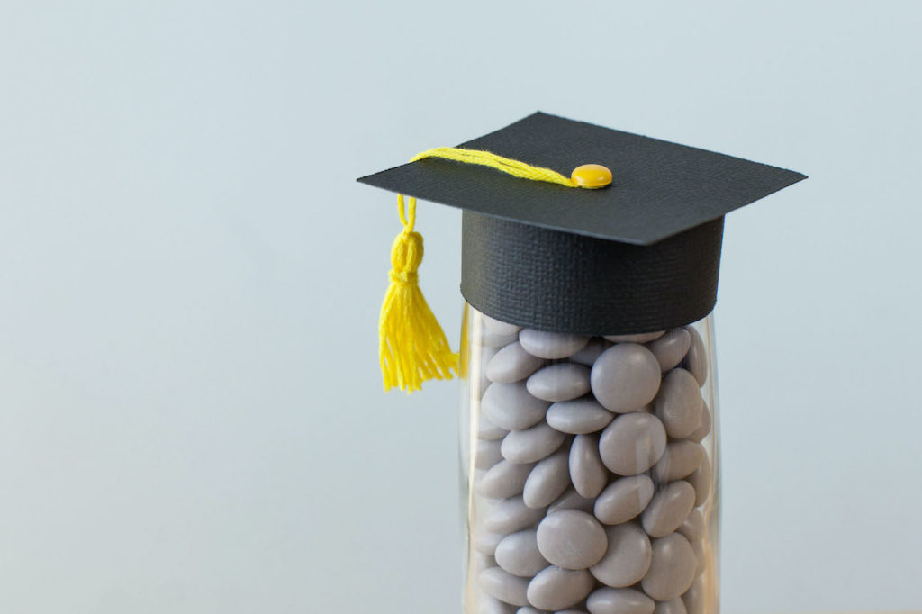 Jar of candy with graduation cap