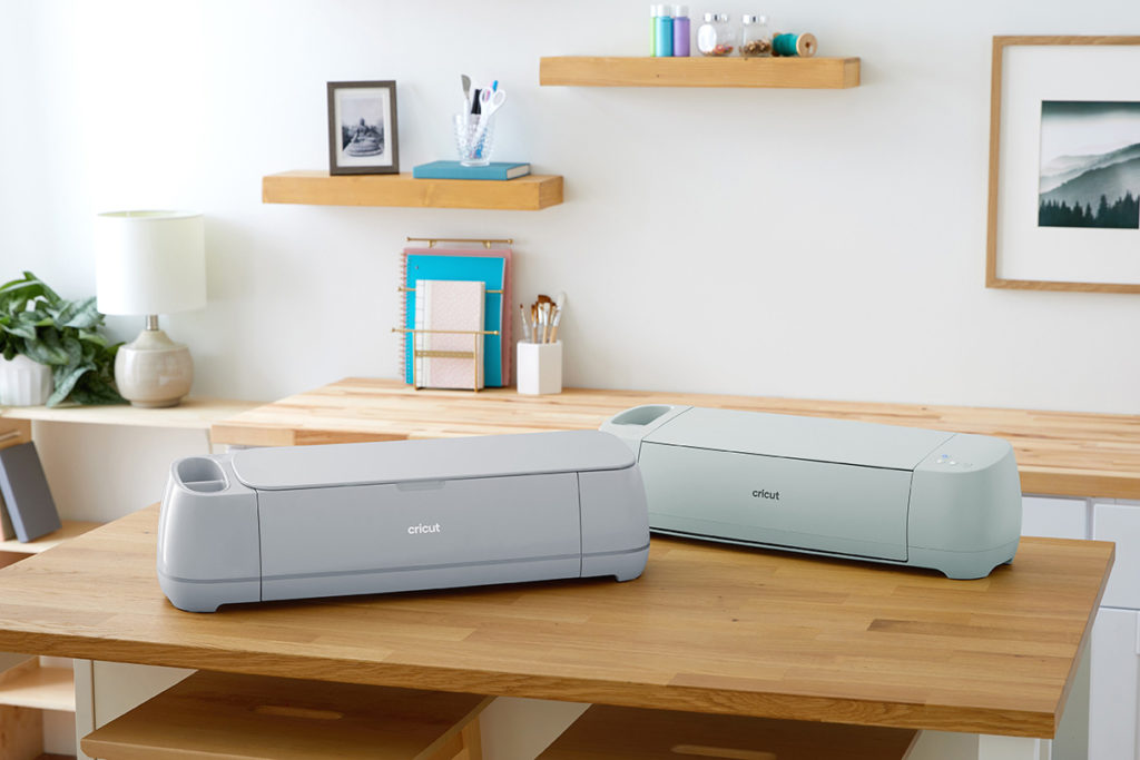 Cricut Maker 3 and Cricut Explore 3 together on table
