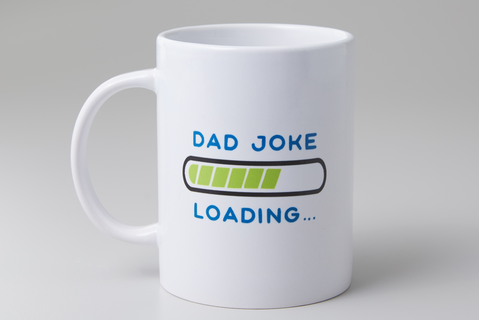 Last minute Father's Day gift idea. A white mug reading "dad joke loading" sits on an off-white background. 