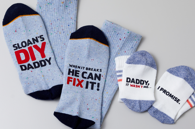Blue and white matching socks with silly iron-on phrases make the perfect last minute Father's Day gift. 