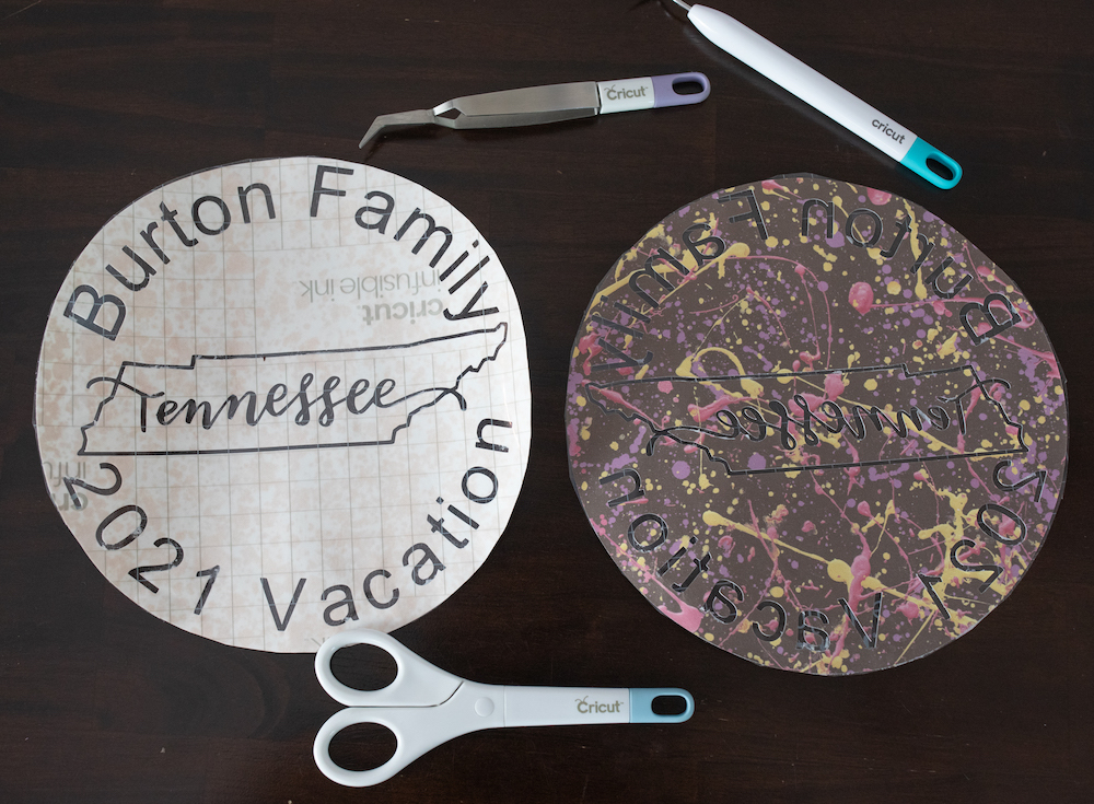 A Cricut Design for a fun summer outfit of matching family tees is laid beside the Cricut tools used to week and cut the design