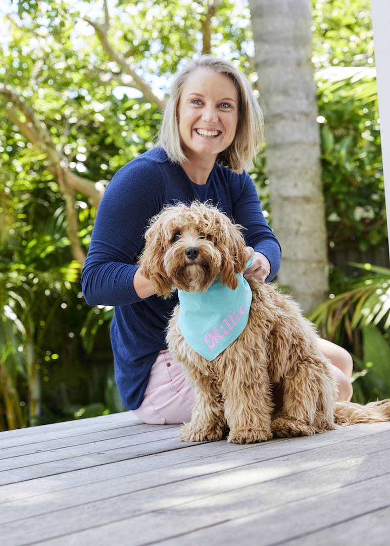 Alyssa Healy with dog wearing Cricut-made bandana