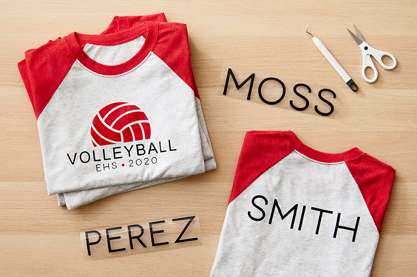 Athletic shirts with volleyball designs and the last names "Moss," "Perez," and "Smith"