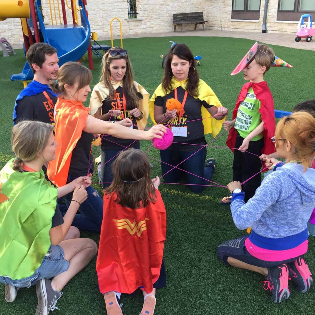 Paige Chenault and children during TBPP activity