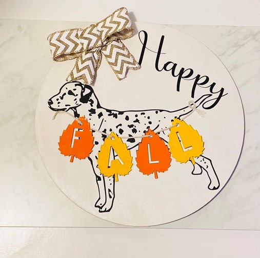 plaque with dalmatian that says "Happy Fall"